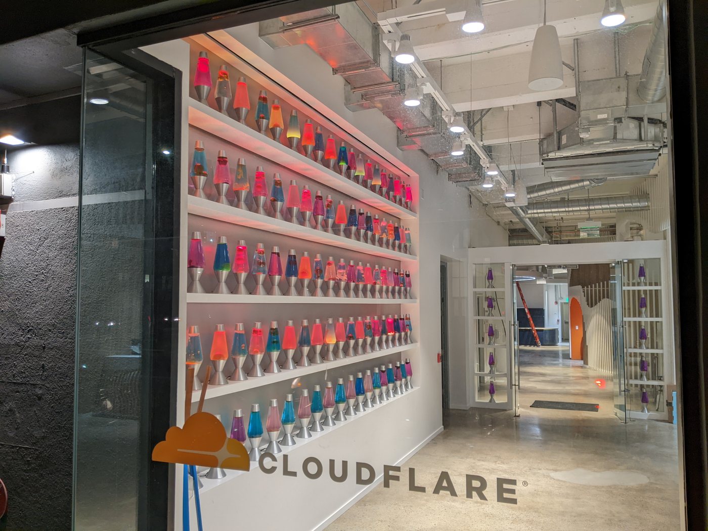 The LavaRand lava lamp wall inside Cloudflare's San Francisco lobby, an entropy source for the cloud security and tech infrastructure platform that disclosed the Containers cross-tenant leak