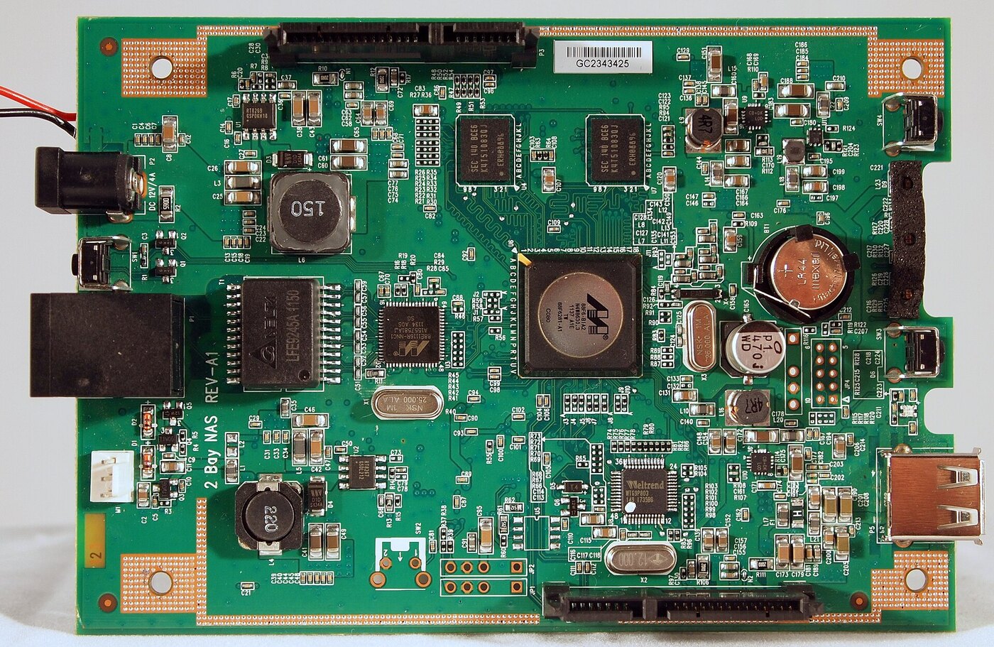 Mainboard of a D-Link ShareCenter Pulse DNS-320 two-bay NAS, the end-of-life tech infrastructure family exploited in the proxyjacking campaign